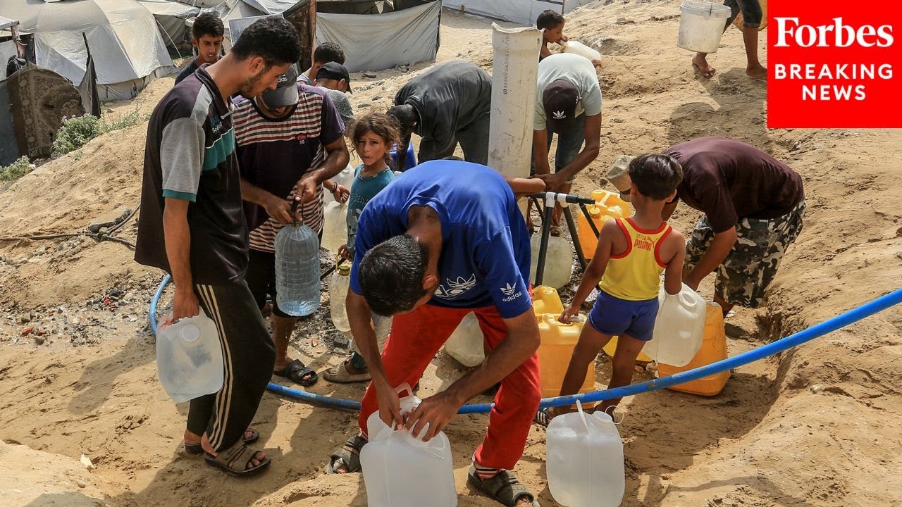 Palestinians Rush To Claim Humanitarian Aid In Gaza Moments After Airdrop Touches Down
