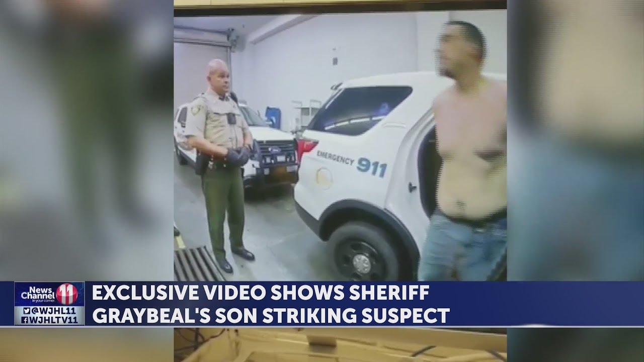 JUST IN: Video shows lieutenant, son of local sheriff, slapping handcuffed man