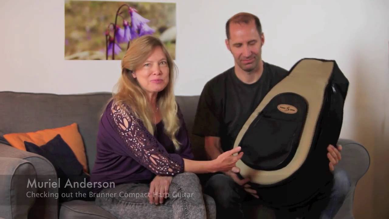 Muriel Anderson checking out the Brunner Compact Harp Guitar