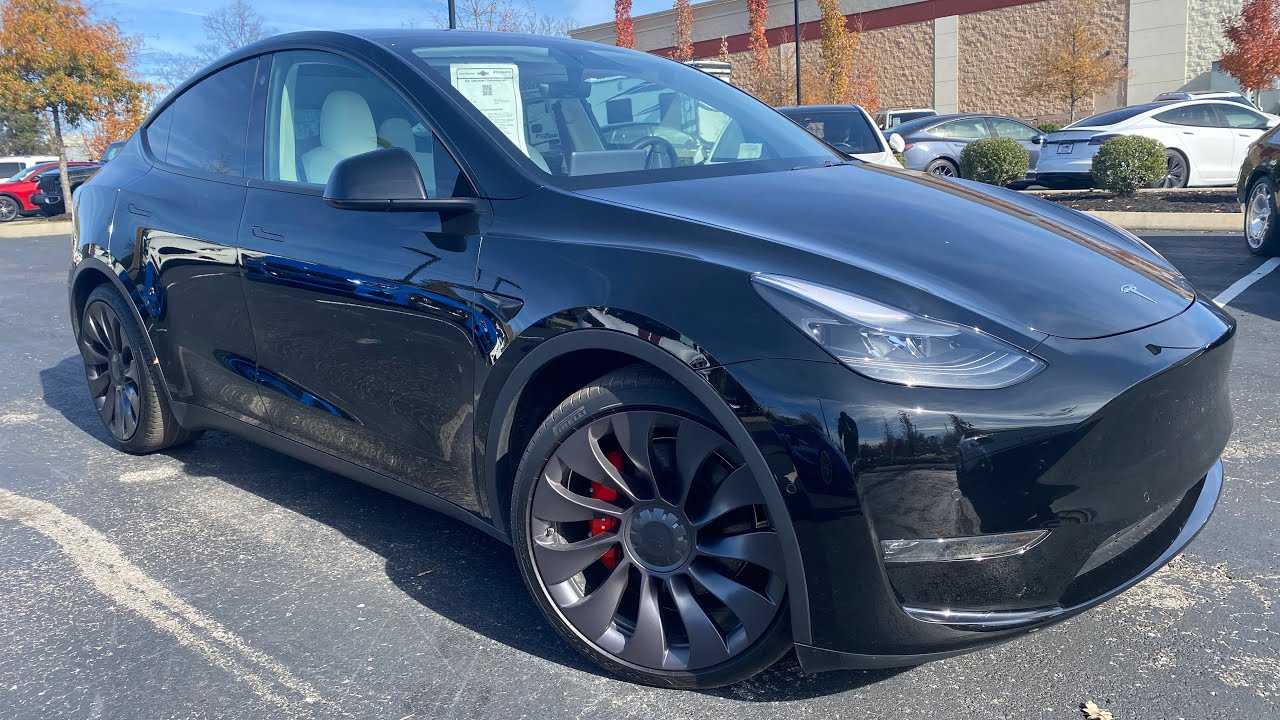 Тест-драйв и обзор Tesla Model Y Performance POV 2021 года