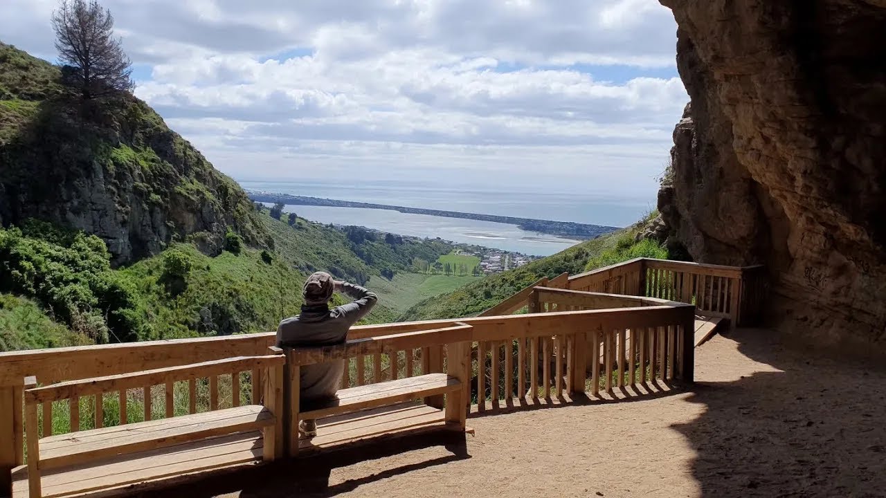 Walking to a cave with an amazing ocean view