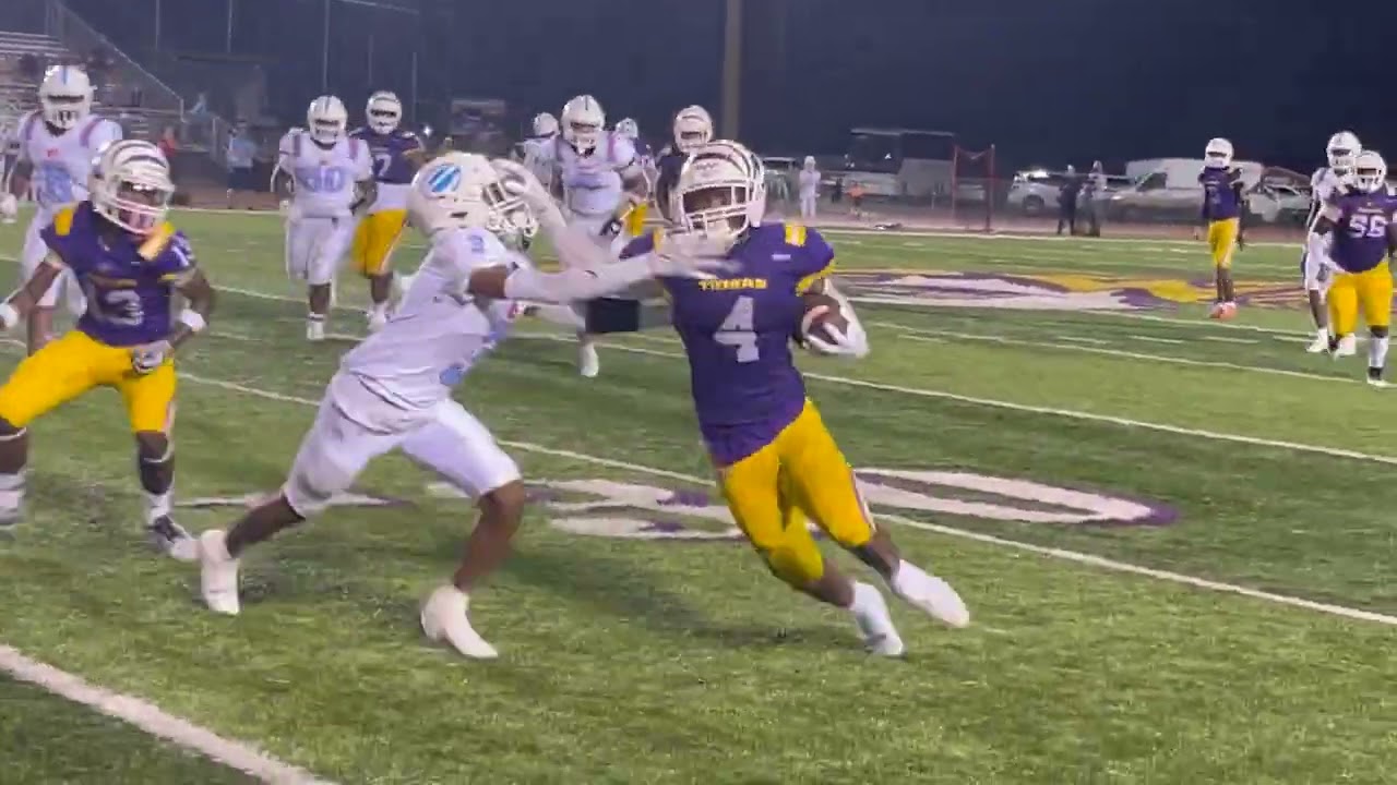 Westgate battles past Evangel, surges to 34-12 victory after lighting delay, flag-filled start