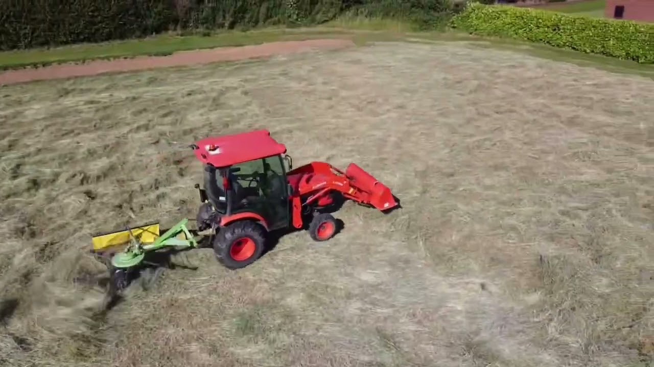Kubota turning hay