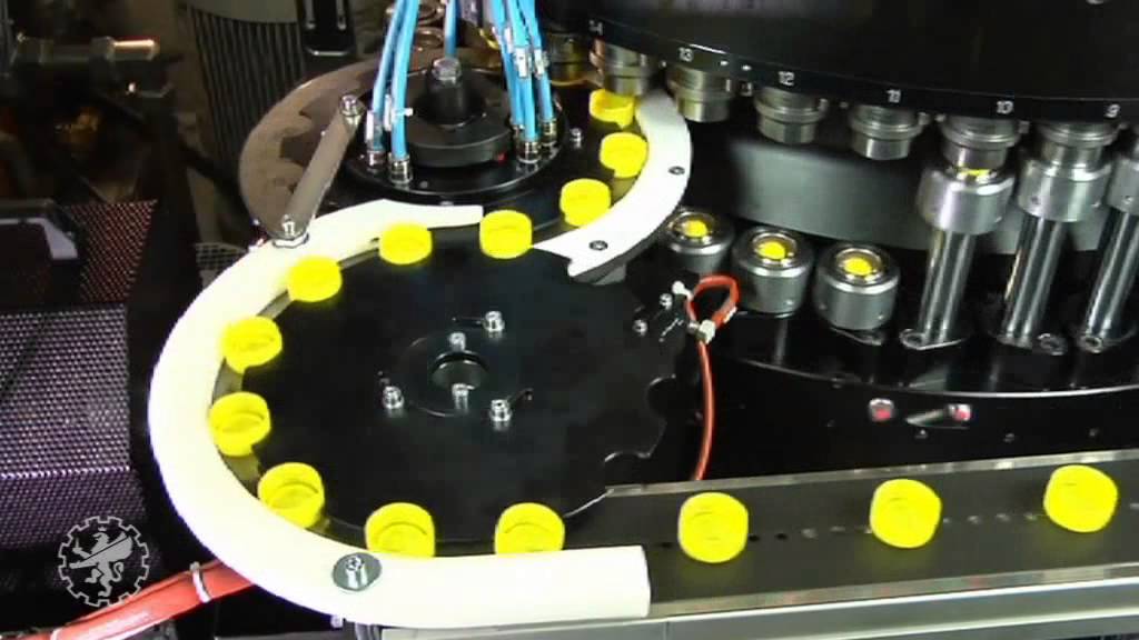 SACMI Plastic Closure manufacturing plant. Sacmi CCM - Continuous Compression Moulding