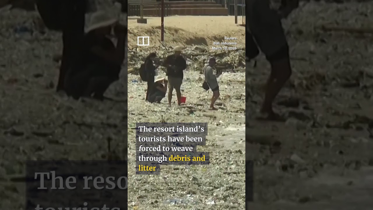 Bali beach covered by waves of trash