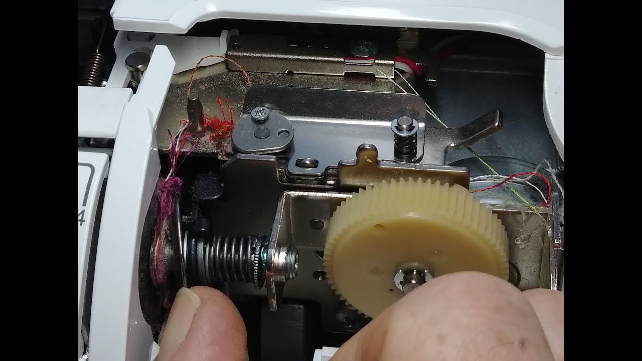 Sewing Machine Tension Problems. Thread Caught in Upper Tension Unit.