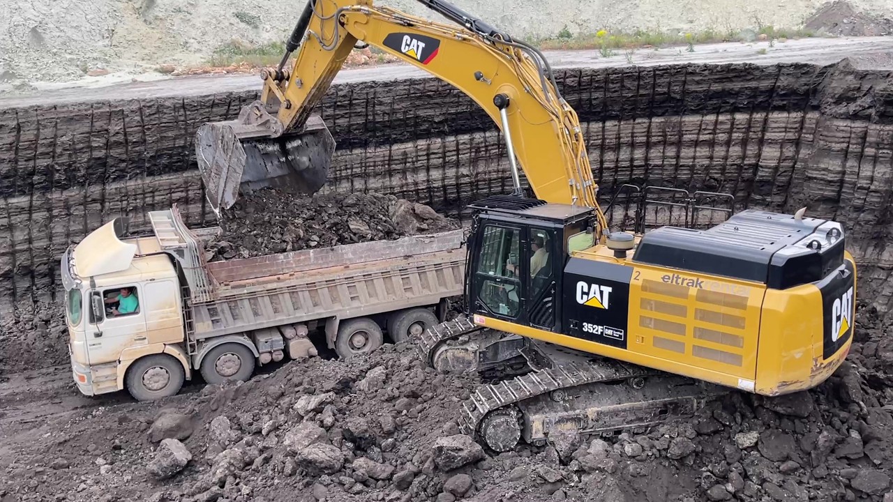 Caterpillar 352F Excavator Loading MAN & Mercedes 4 Axle Trucks - Ascon Ltd