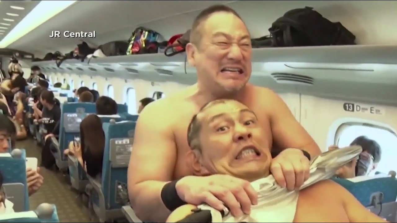 Japanese wrestlers exchange swift moves on bullet train match
