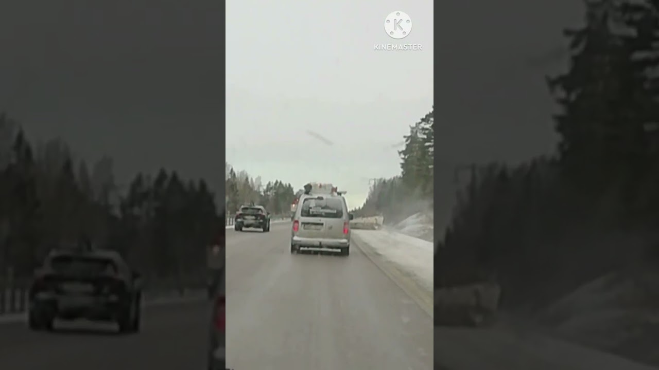 Driving Behide Two Big Snow Machines