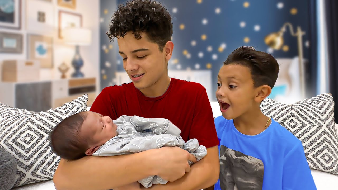 Brothers meet Baby for the first time!