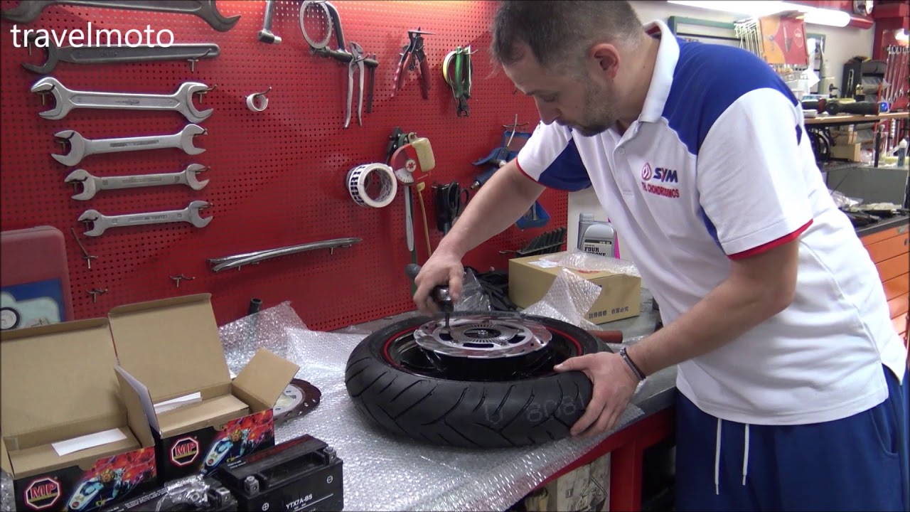 disk brake repair: SYM GTS 250 scooter