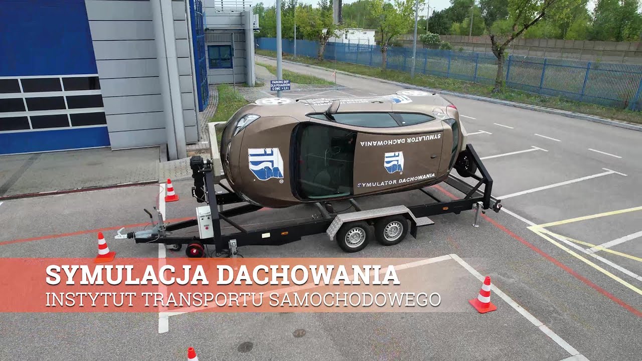 Symulacja dachowania pojazdu - podnóżek OKIDAY do fotelika podczas symulacji dachowania