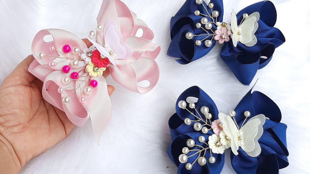 Laço boutique duplo com arranjo e florzinha 3D/ Laço festa/ Laço Luxo