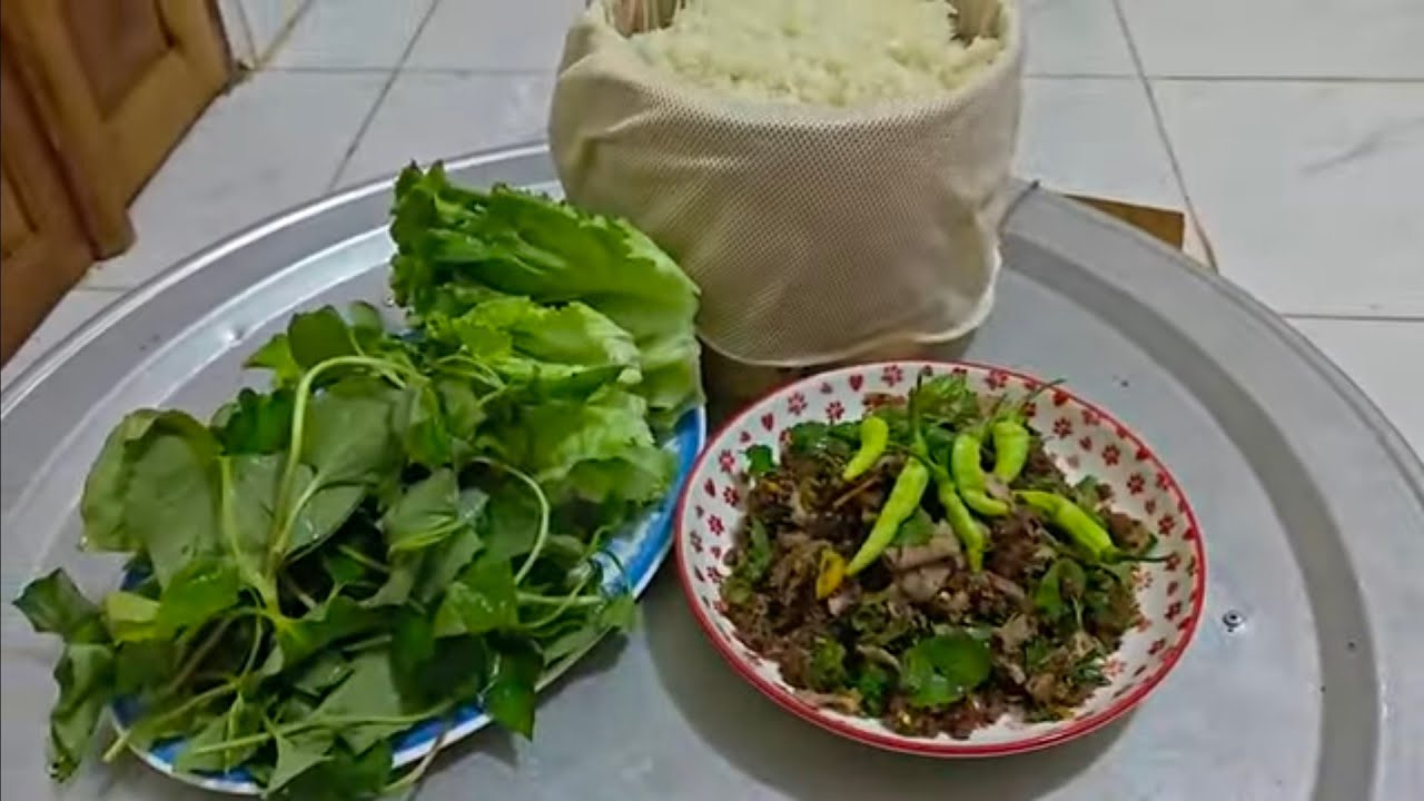 ໄປຊື້ໃບຜັກຢູ່ຕະຫລາດລາວOC ມາຮອດເຮືອນແລ້ວກະເຮັດຂອງກິນແລງຕໍ່