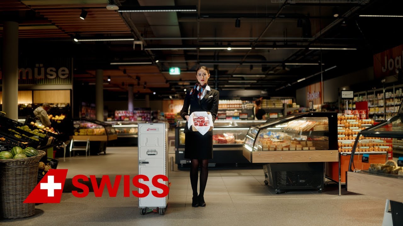 Our Cabin Crew Member giving you shopping instructions | SWISS