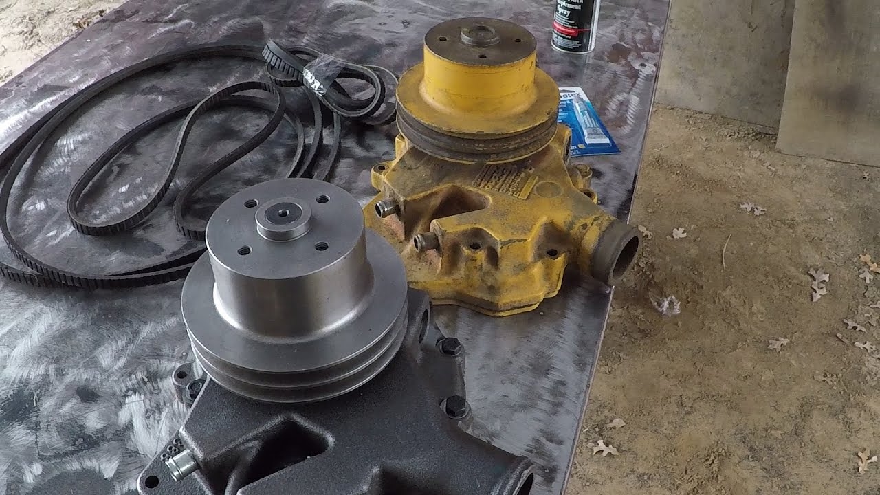 John Deere 310D: замена водяного насоса и самодельного резервуара охлаждающей жидкости
