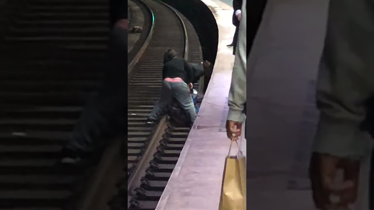 Sydney Train Narrowly Avoids Hitting People on Tracks