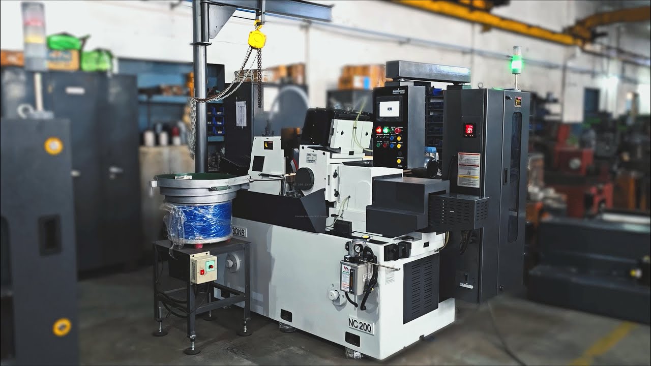 NC Centerless Grinding Machine with Throughfeed Automation | Bhagwansons