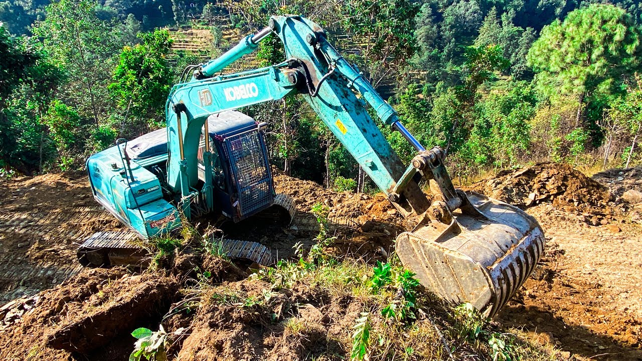 Heart-Stopping Excavator Maneuvers: Carving a Road Through Treacherous Mountain Terrain | Trackhoe