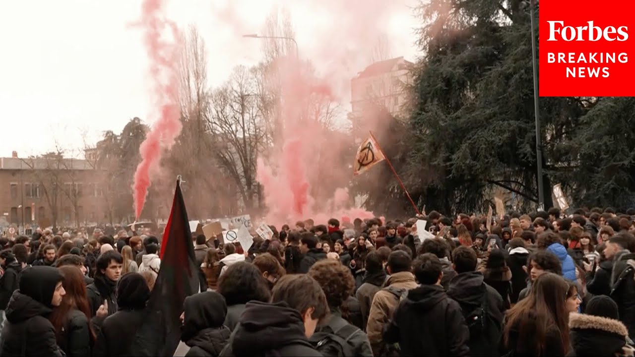 Protesters In Milan Rally Against Planned Presence Of ICE Officers At The Olympics