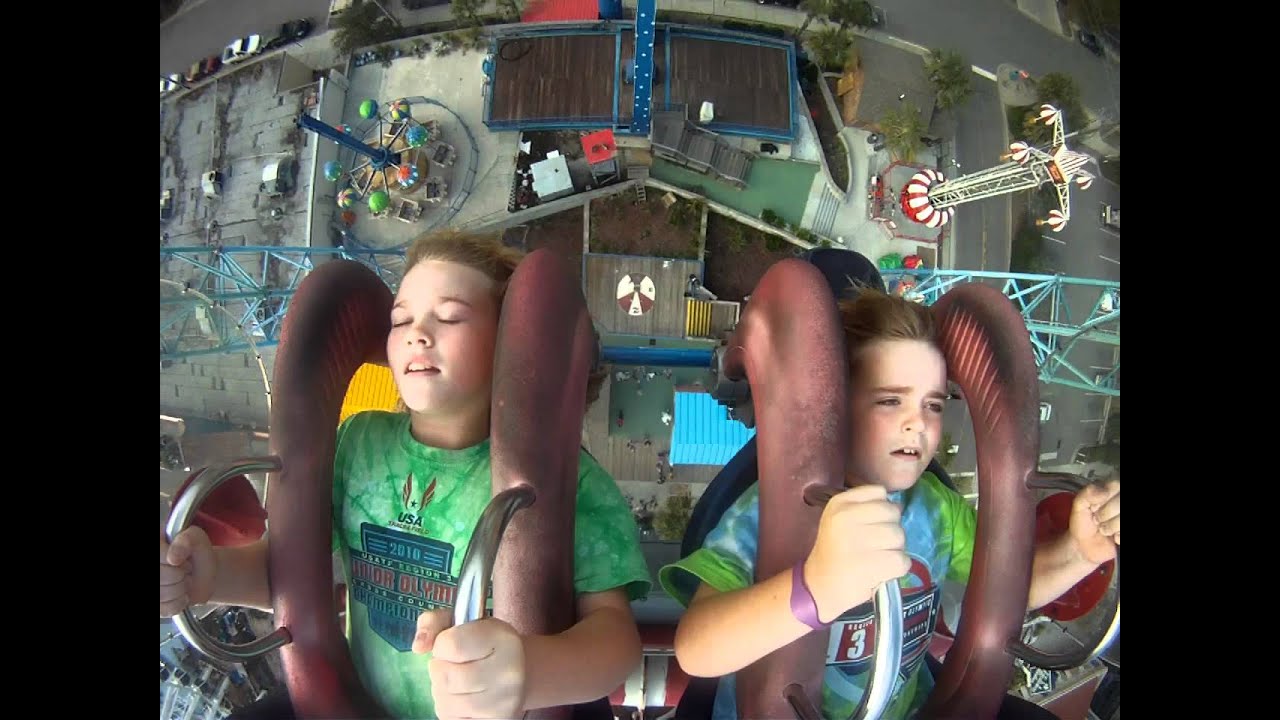 Brother and Sister enjoy a ride - Sling Shot in Myrtle Beach