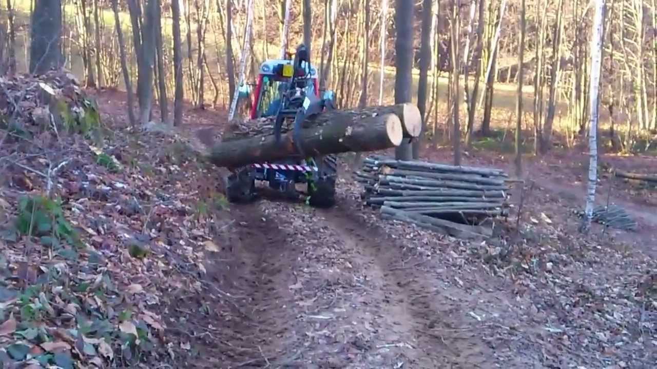 Carraro trx 9800 con pinza legna 2