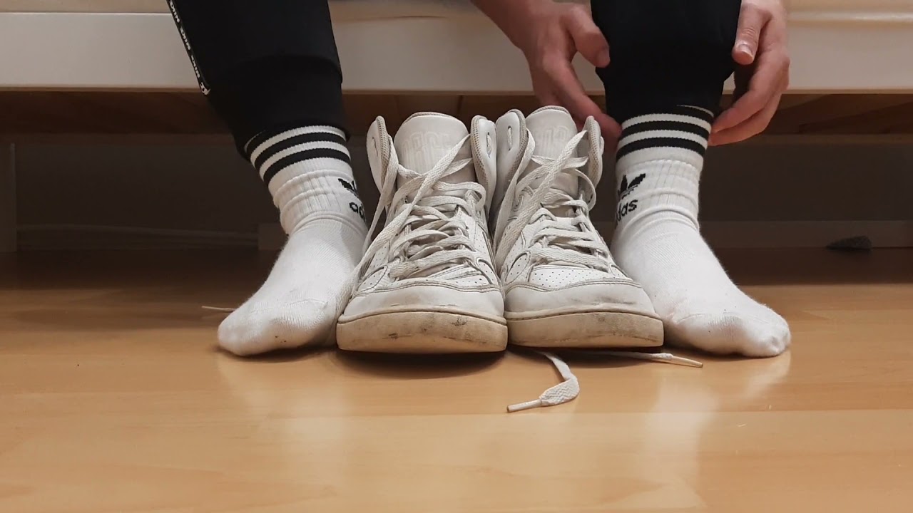 Teenboy playing with his Son of Force and Adidas Socks