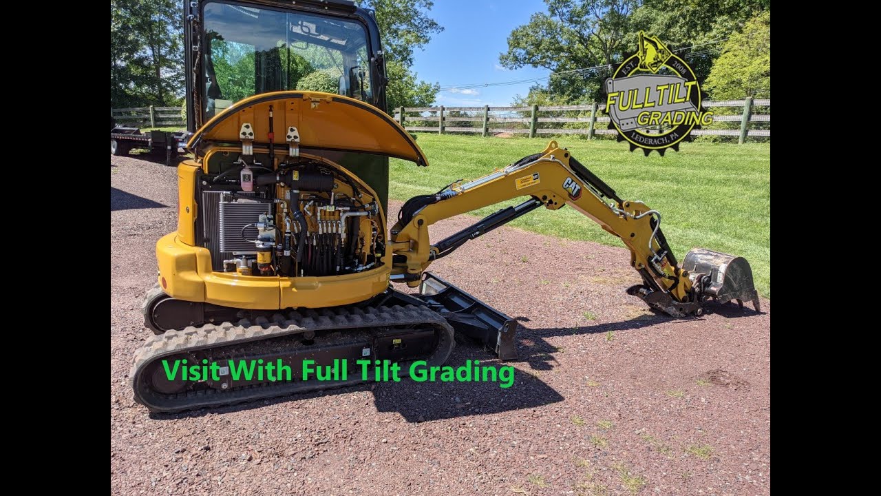 Full Tilt Grading Tries Out and Watches my CAT 303 E