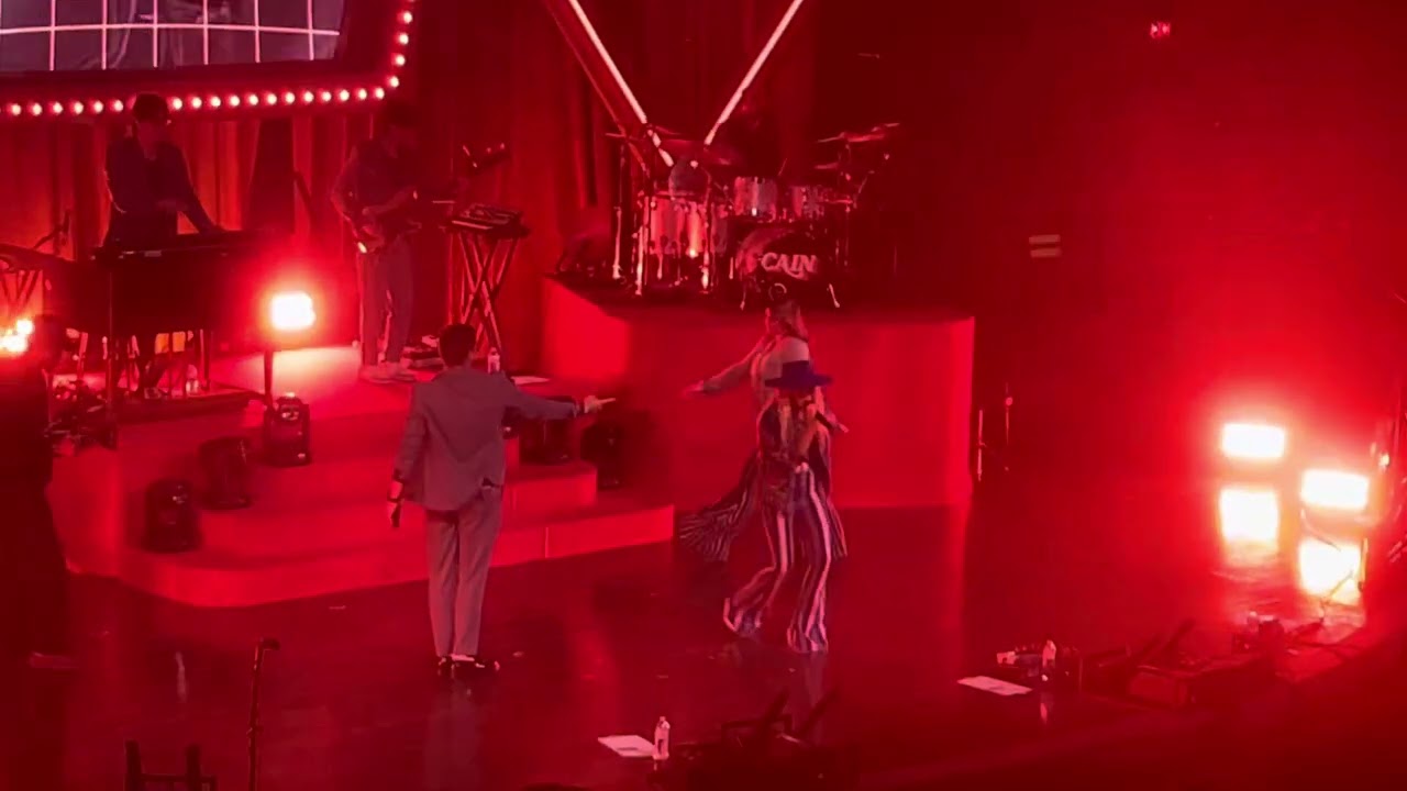 Cain singing Hands Up Sing Out