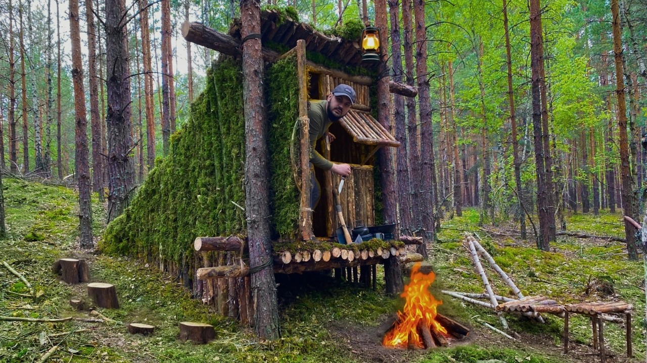 Building a COZY and SAFE shelter among the trees on a SLOPE | Bushcraft | Cooking on a fire