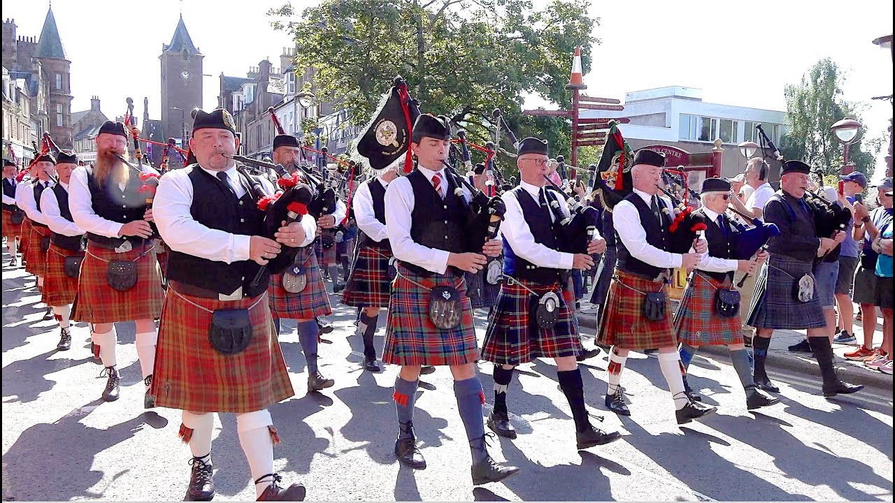 Massed Pipes and Drums lead Chieftains parade to the 2025 Crieff Highland Gathering in Scotland