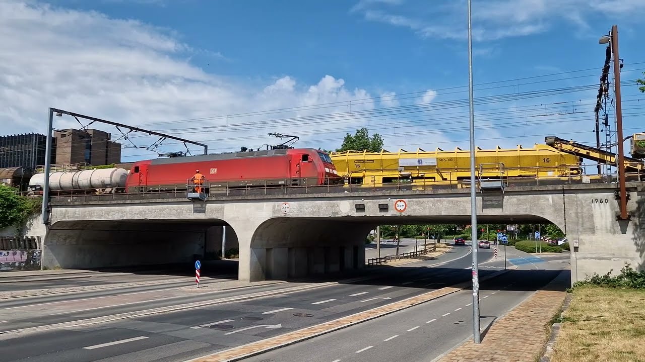 Freight train over the bridge at Thomas B. Thriges Gade, Odense, Denmark - June 17th 2023