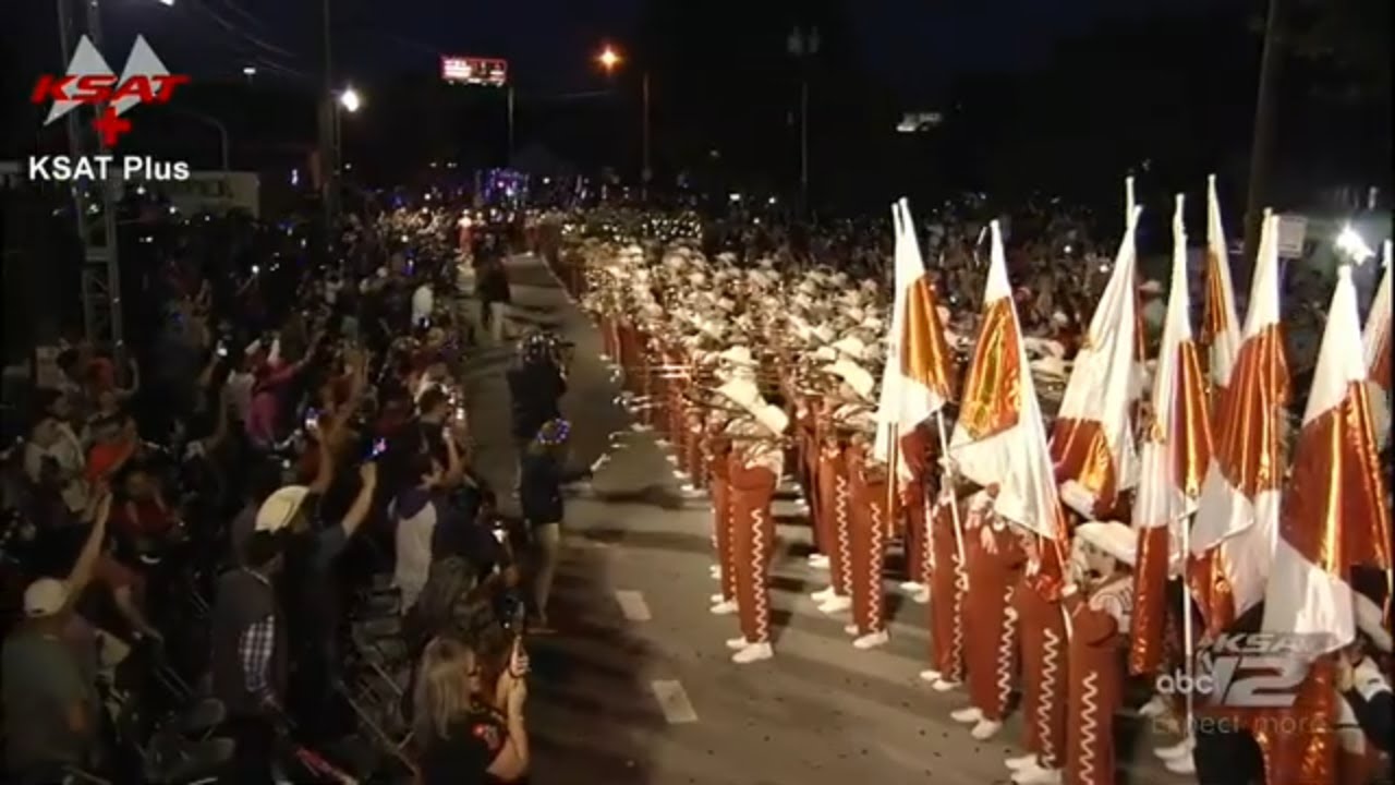 UT Longhorn Band gets crowd going at Fiesta Flambeau Parade