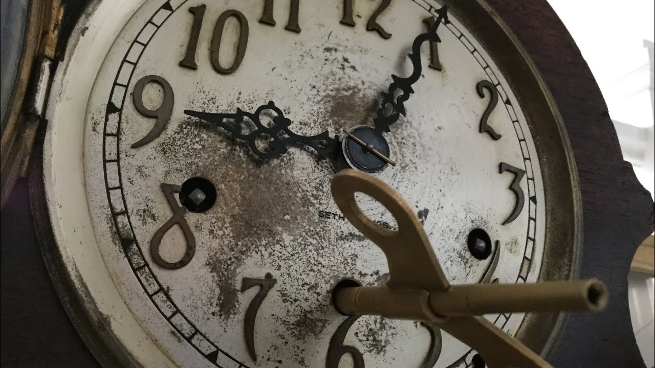 Winding the Seth Thomas  mantel clock.