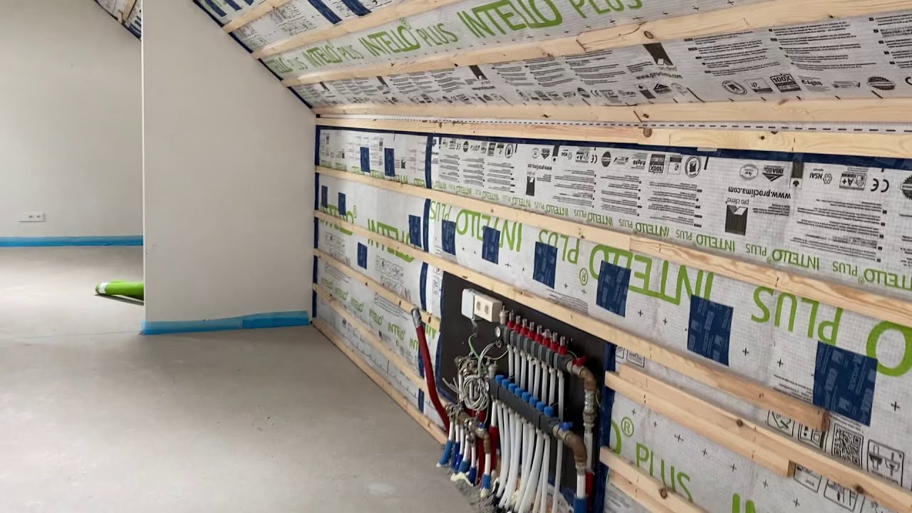Dakisolatie met luchtdichtingsfolie 'Intello Plus' en ingeblazen met cellulose isolatie
