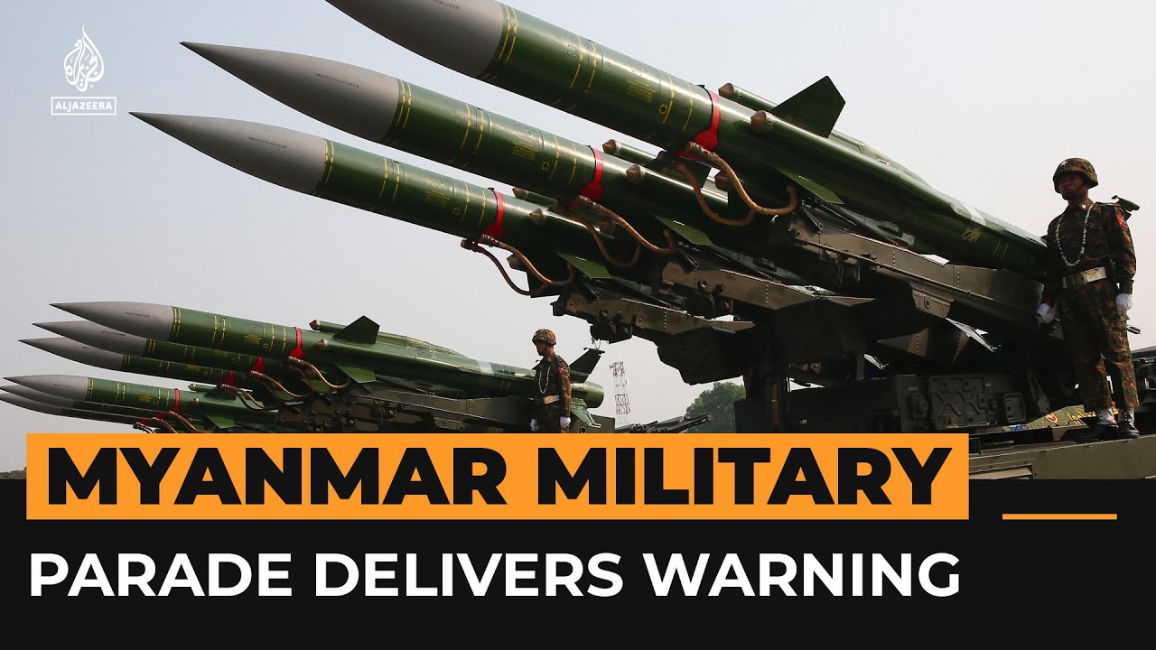 Myanmar parades military and issues warning to 