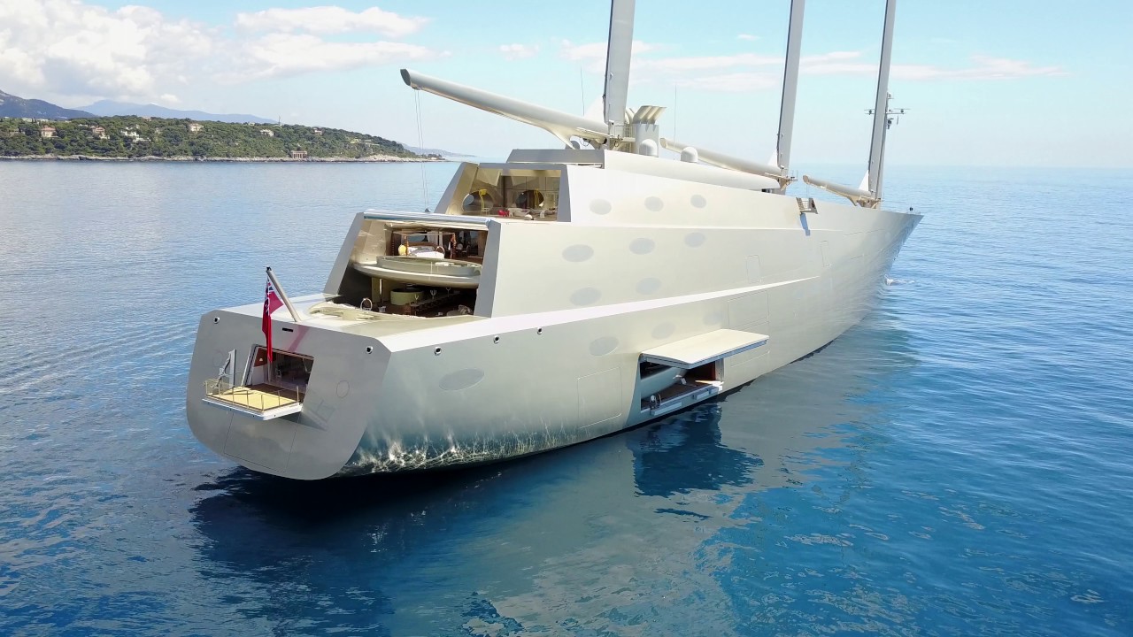 2 Yachts. $1 Billion - Exclusive Close up of Sailing Yacht and Motor Yacht A - 4k