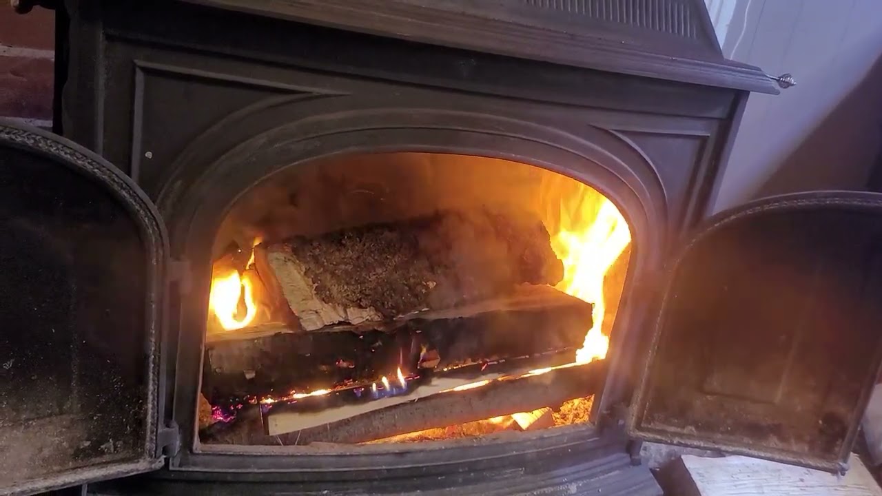Log cabin style fire lighting my '77 Vermont Castings Vigilant with barely seasoned wood.