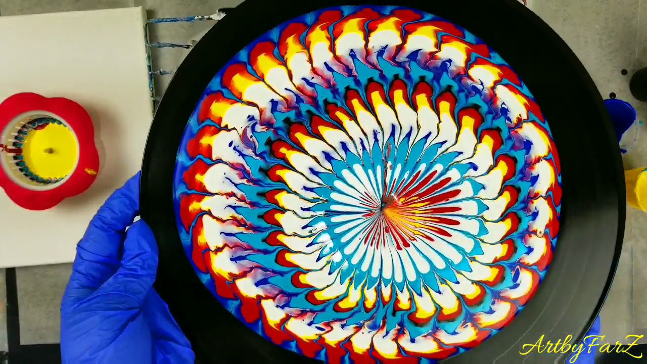 (23) Acrylic pour painting with a Sink strainer , colorful puddle pour