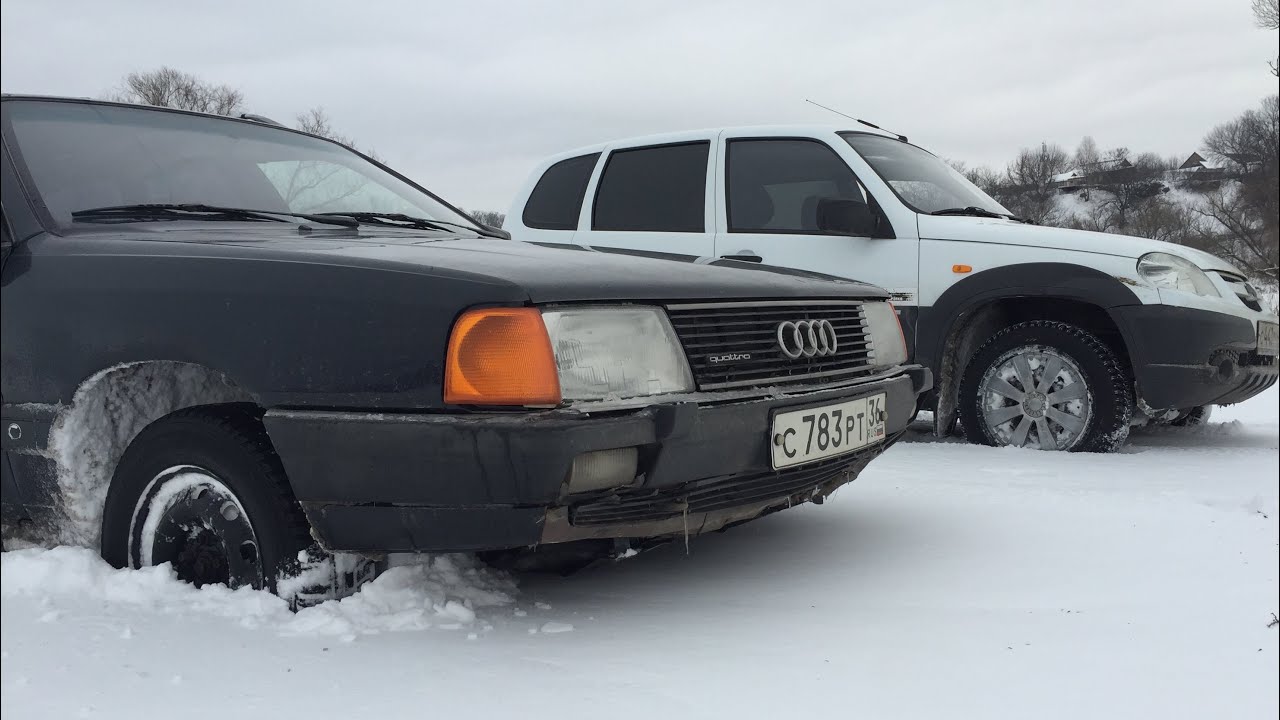 Ауди 100 quattro против Шевроле Нива по снегу и горкам...