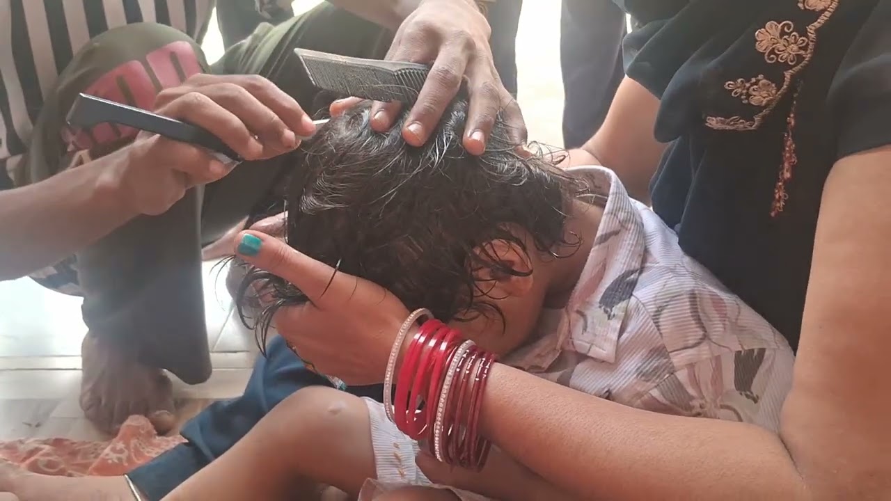 bete ka mundan huaa mandir par