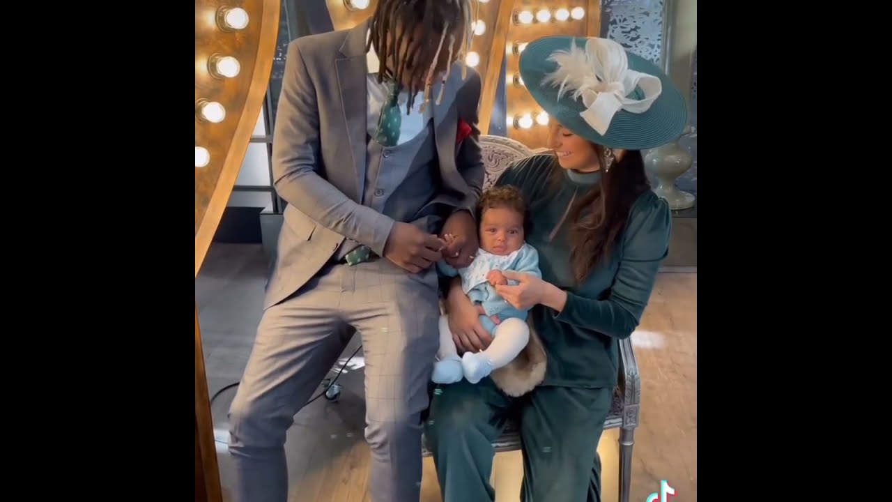 KENYAN DANCER TILE PACBRO ENJOYING TIMES WITH HIS SON IN A MALL IN SPAIN.