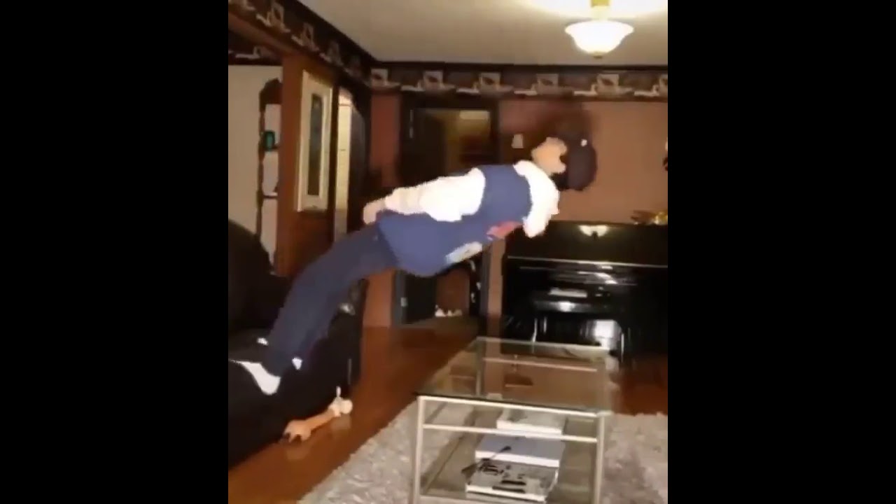 Guy breaks glass table