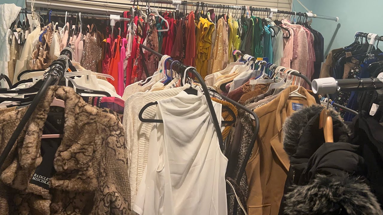 Making room to sell clothes with these tall  clothing racks.