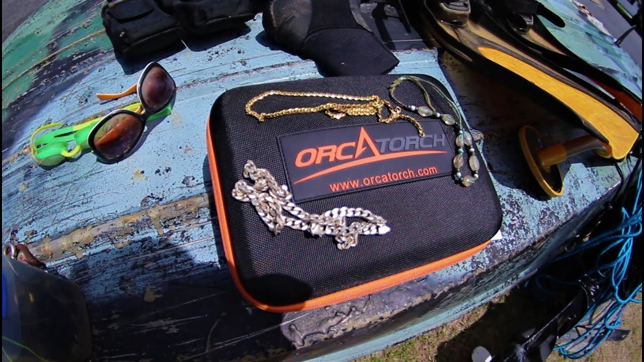 Found Silver and GOLD night diving with the new Orca Torch D511