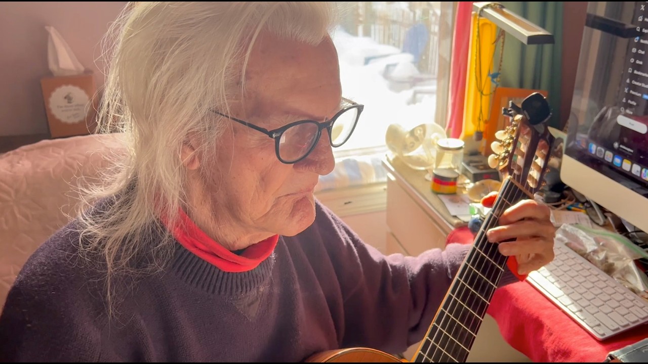 Playing Guitar on a snowy Sunday