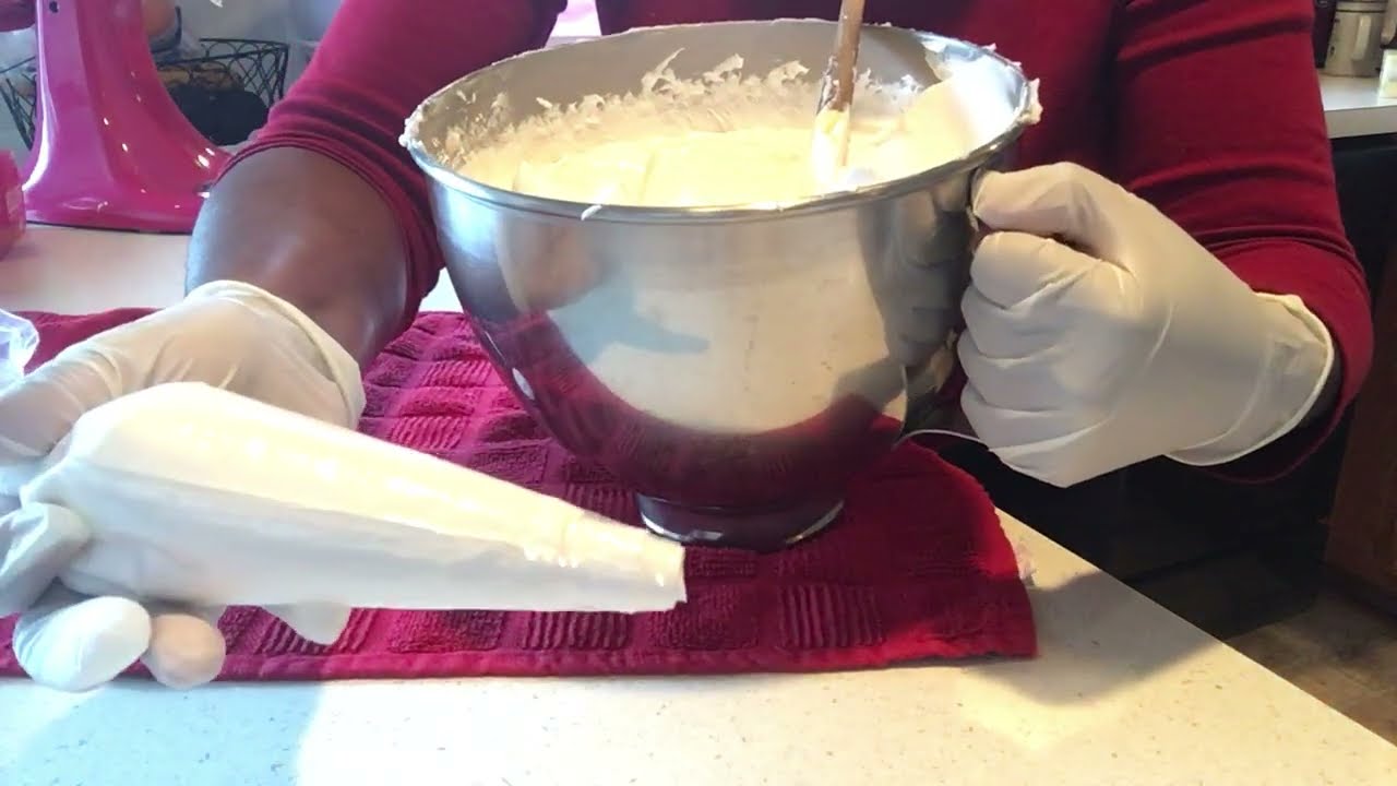 Prepping and filling a disposable icing/pastry bag with buttercream