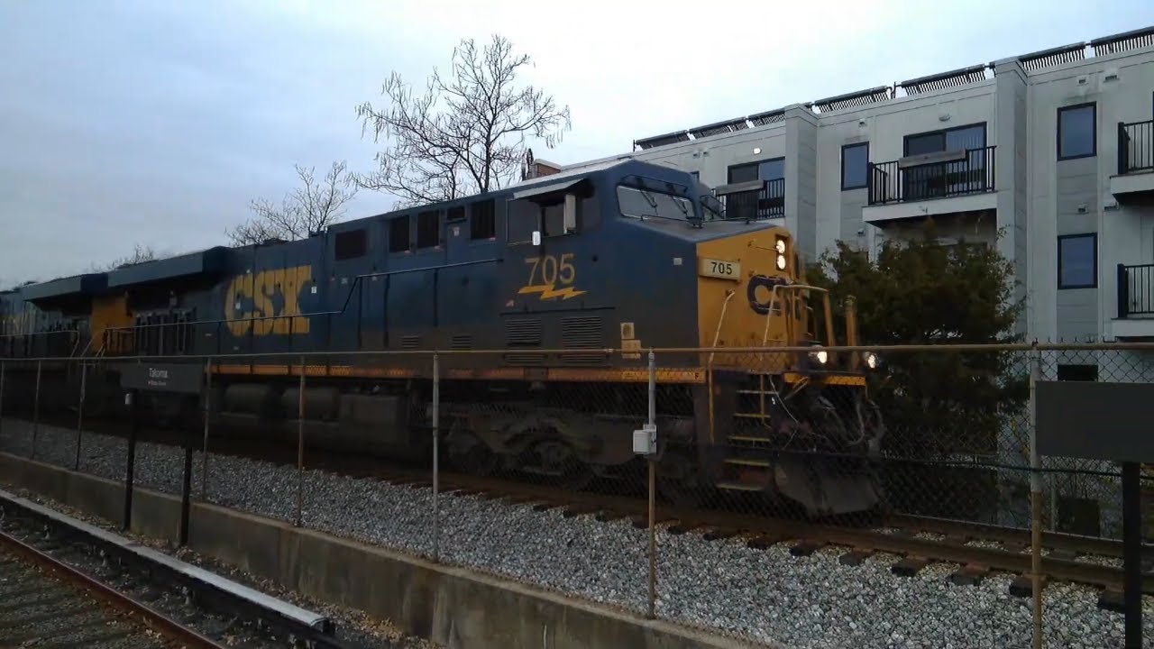 CSX Train Passing By at WMATA Takoma Metro Station. (Close Up)