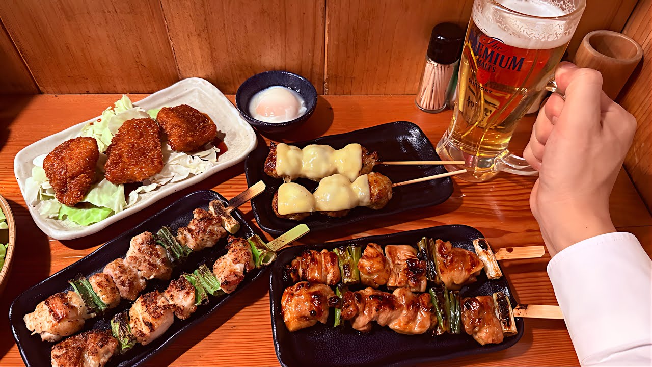 The Dinner of Japanese Salarymen at the Izakaya Torikizoku