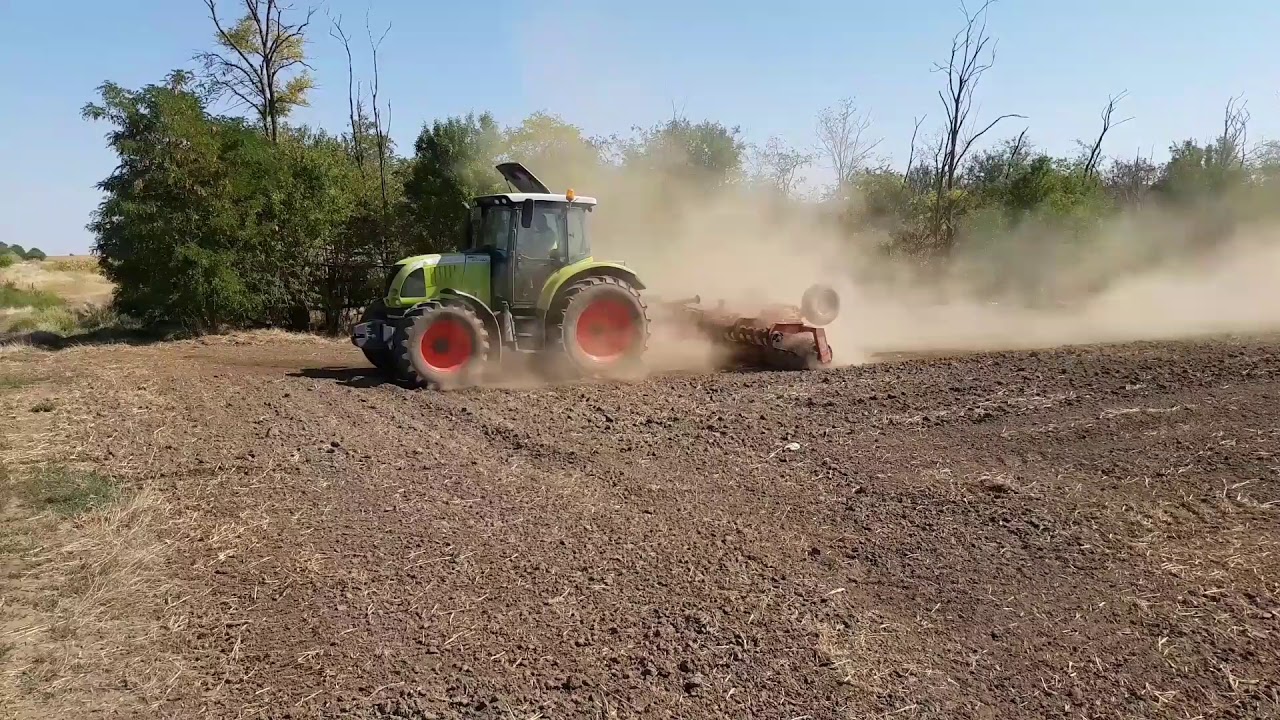 Claas Ares 557 ATX - HE-VA Tip Roller 450